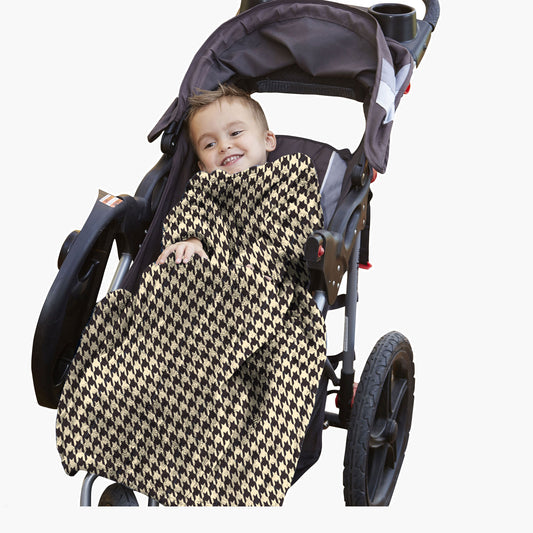The Stroller Slanket - The Original Blanket with Sleeves. Kid in a stroller wrapped up in the luxurious material to stay warm on chilly evening or morning walks