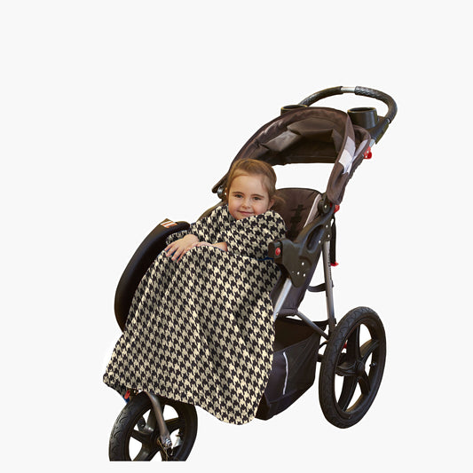 The Stroller Slanket - The Original Blanket with Sleeves. Kid in a stroller wrapped up in the luxurious material to stay warm on chilly evening or morning walks