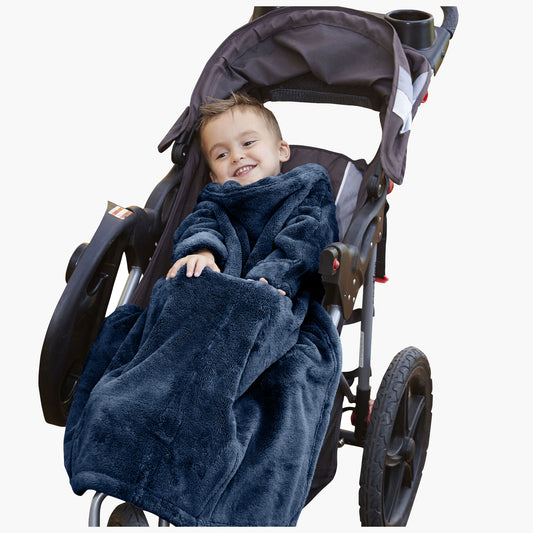 The Stroller Slanket - The Original Blanket with Sleeves. Kid in a stroller wrapped up in the luxurious material to stay warm on chilly evening or morning walks