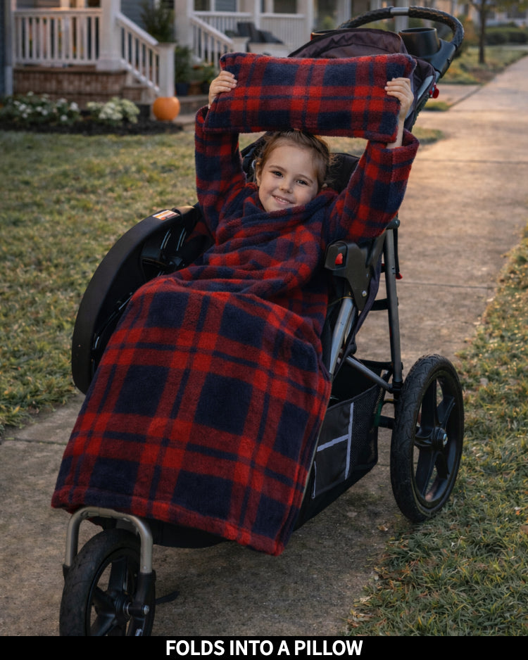 Product Images of Stroller Slanket folded into a pillow being held up by the child