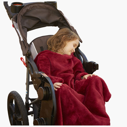 The Stroller Slanket - The Original Blanket with Sleeves. Kid in a stroller wrapped up in the luxurious material to stay warm on chilly evening or morning walks