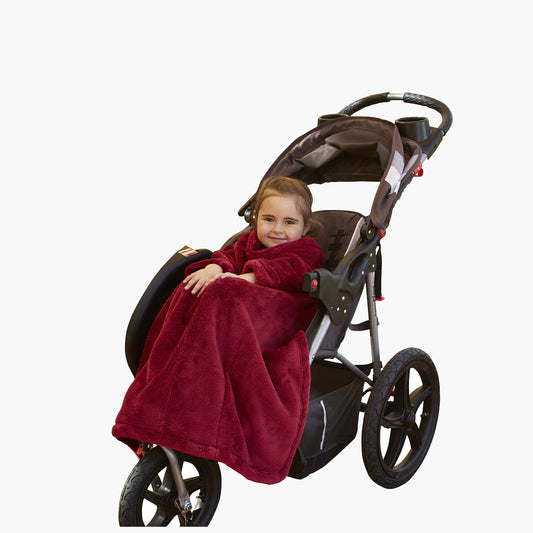 The Stroller Slanket - The Original Blanket with Sleeves. Kid in a stroller wrapped up in the luxurious material to stay warm on chilly evening or morning walks