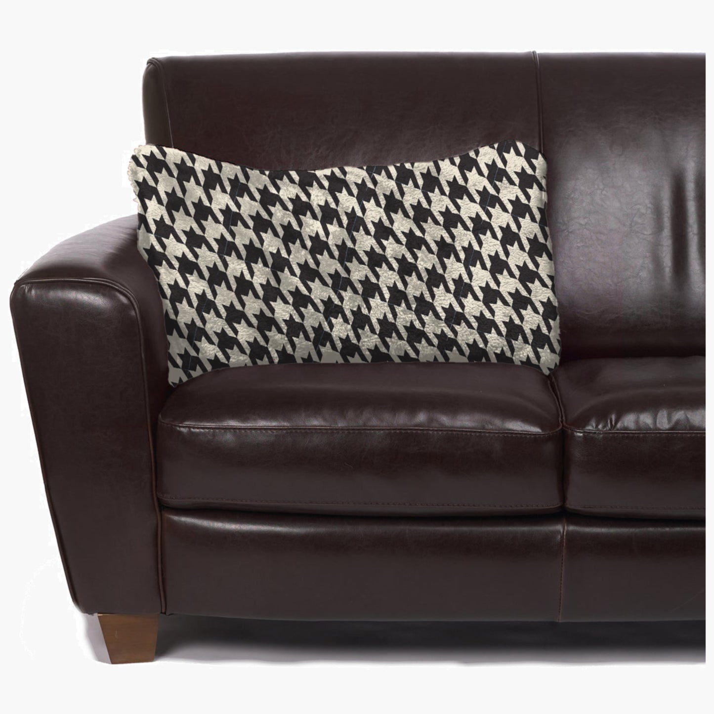 Slanket - The Original Blanket with Sleeves folds into a couch cushion which is laying on a couch