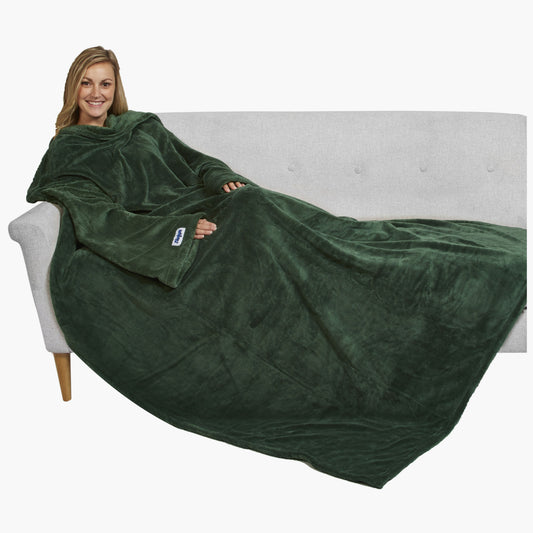 The Ultimate Slanket - The Original Blanket with Sleeves. Women using it on a couch.