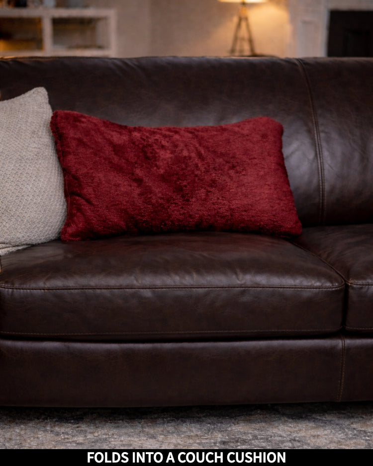 Product Images of Slanket folded into a couch cushion