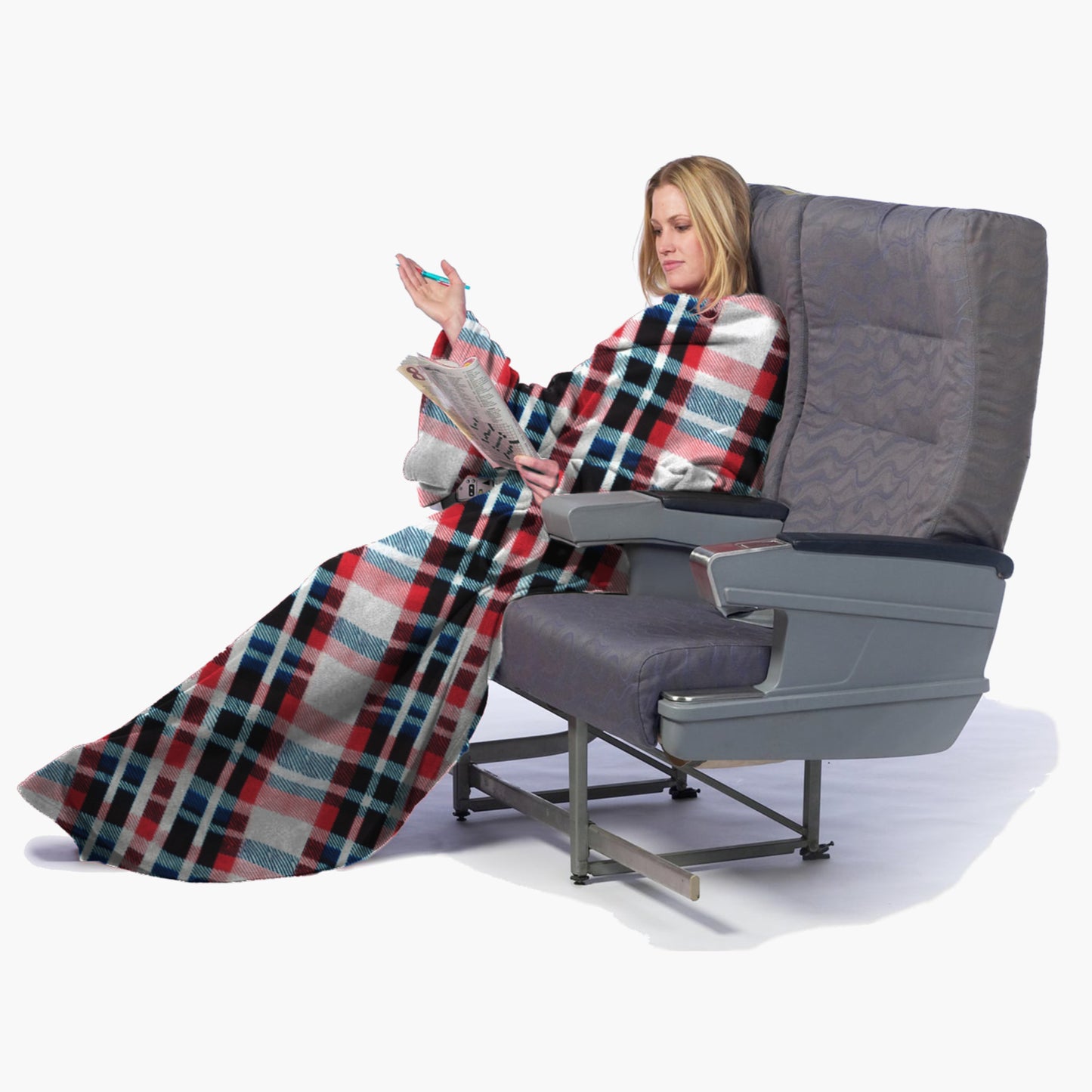 The Ultimate Slanket - The Original Blanket with Sleeves. Women using it while sitting in airplane seat doing a crosswords puzzle