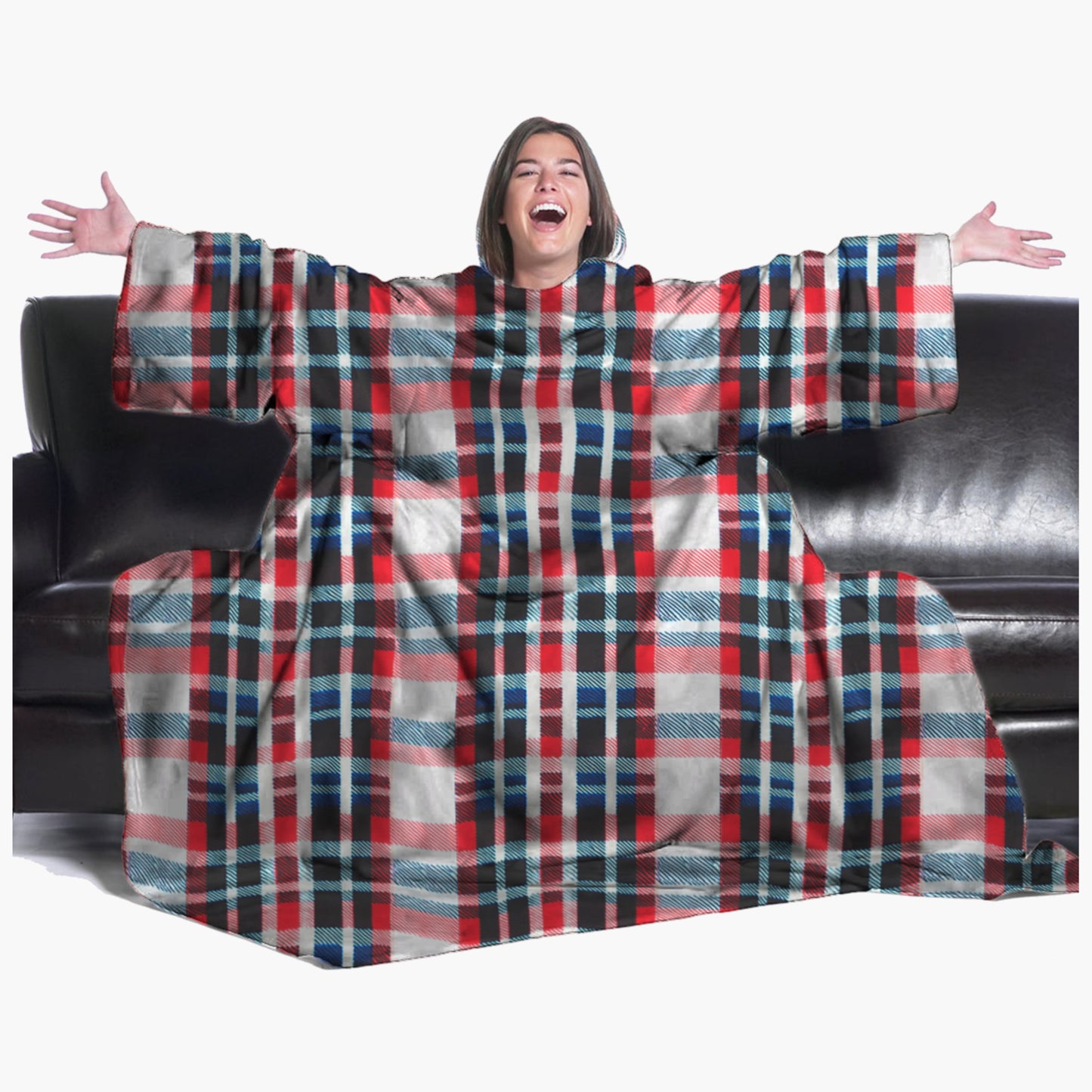 The Ultimate Slanket - The Original Blanket with Sleeves. Women using it on a couch with arms spread out with big smile