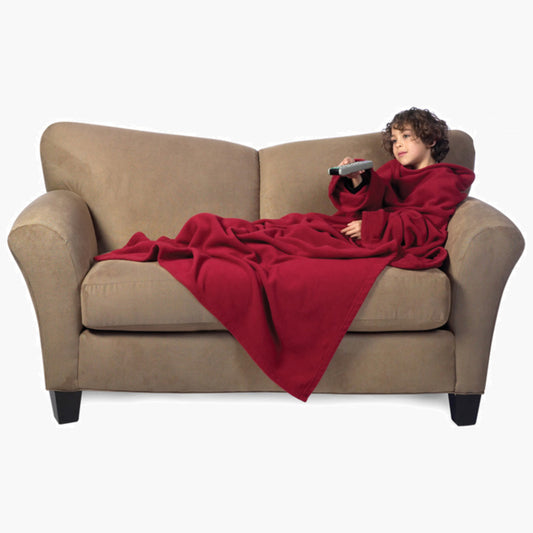 Ultimate Kids Slanket - The Original Blanket with Sleeves shown being used by a kid on a couch
