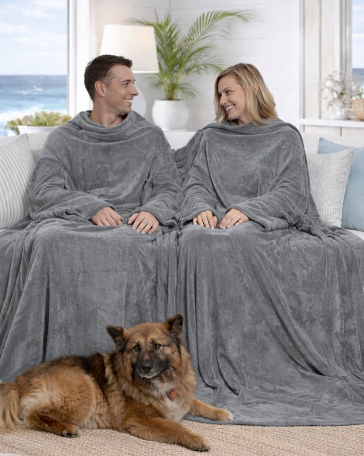Product image of a man and women with their dog using Slanket Siamese and just chatting with each other