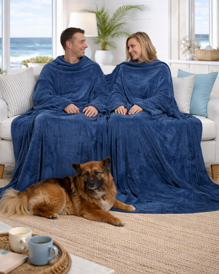 Product image of a man and women with their dog using Slanket Siamese and just chatting with each other