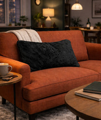 Product Images of Slanket folded into a couch cushion