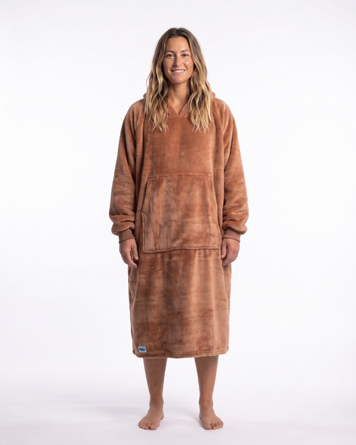 Woman standing in a Mocha Mousse Slanket Long Hoodie, front view