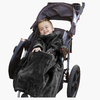 The Stroller Slanket - The Original Blanket with Sleeves. Kid in a stroller wrapped up in the luxurious material to stay warm on chilly evening or morning walks