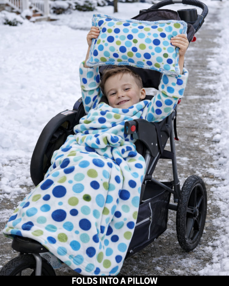 Product Images of Stroller Slanket folded into a pillow being held up by the child