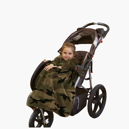 The Stroller Slanket - The Original Blanket with Sleeves. Kid in a stroller wrapped up in the luxurious material to stay warm on chilly evening or morning walks