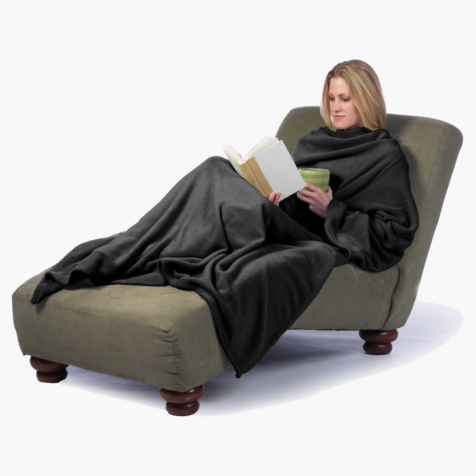 The Ultimate Slanket - The Original Blanket with Sleeves. Women using it while sitting in chaise lounge reading a book and drinking tea