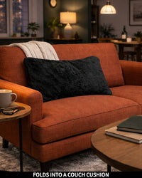 Product Images of Slanket folded into a couch cushion