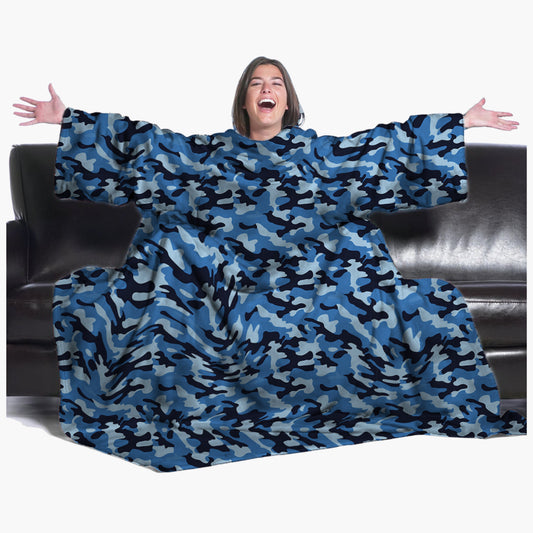 The Ultimate Slanket - The Original Blanket with Sleeves. Women using it on a couch with arms spread out with big smile 