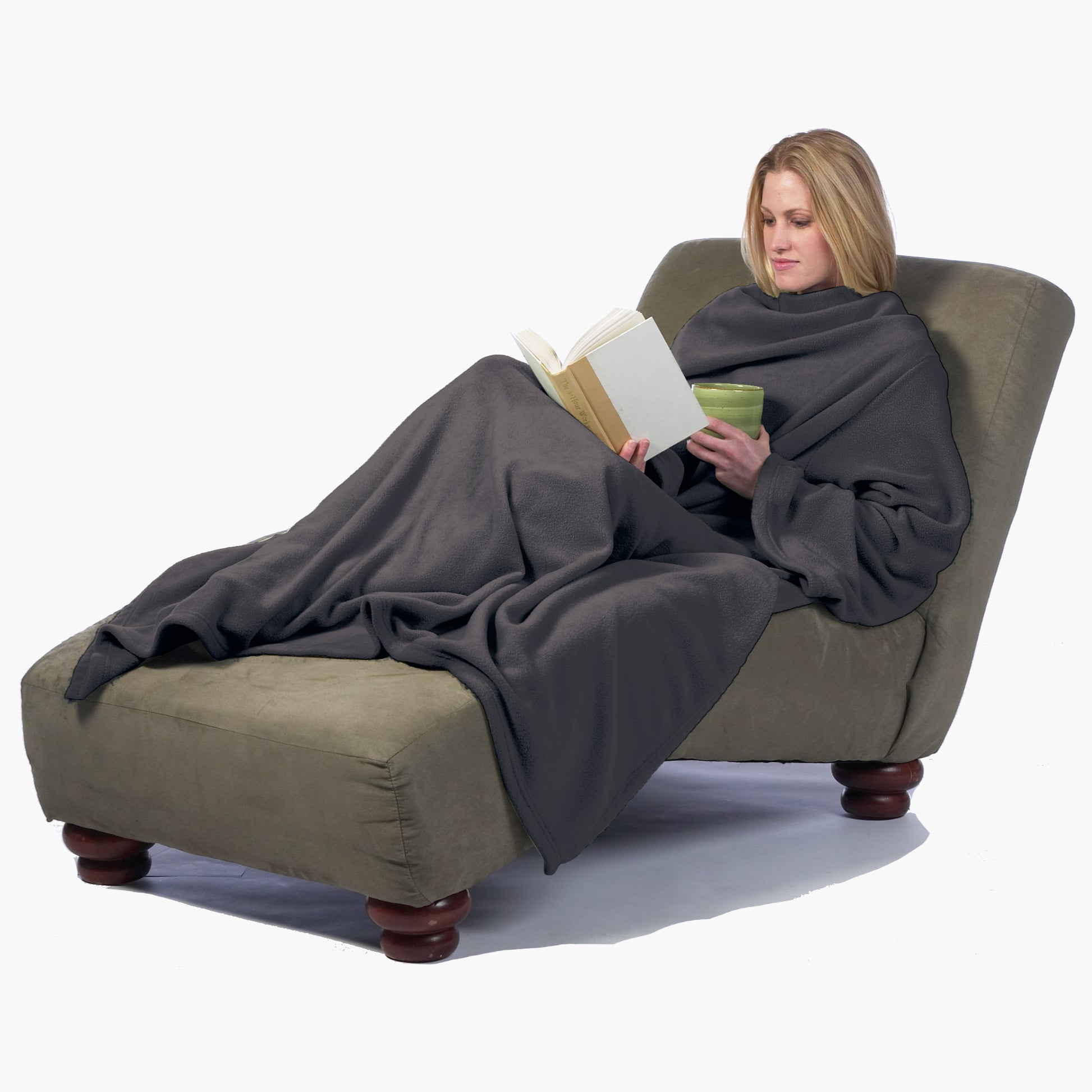 The Ultimate Slanket - The Original Blanket with Sleeves. Women using it while sitting in chaise lounge reading a book and drinking tea