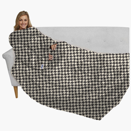 The Ultimate Slanket - The Original Blanket with Sleeves. Women using it on a couch.