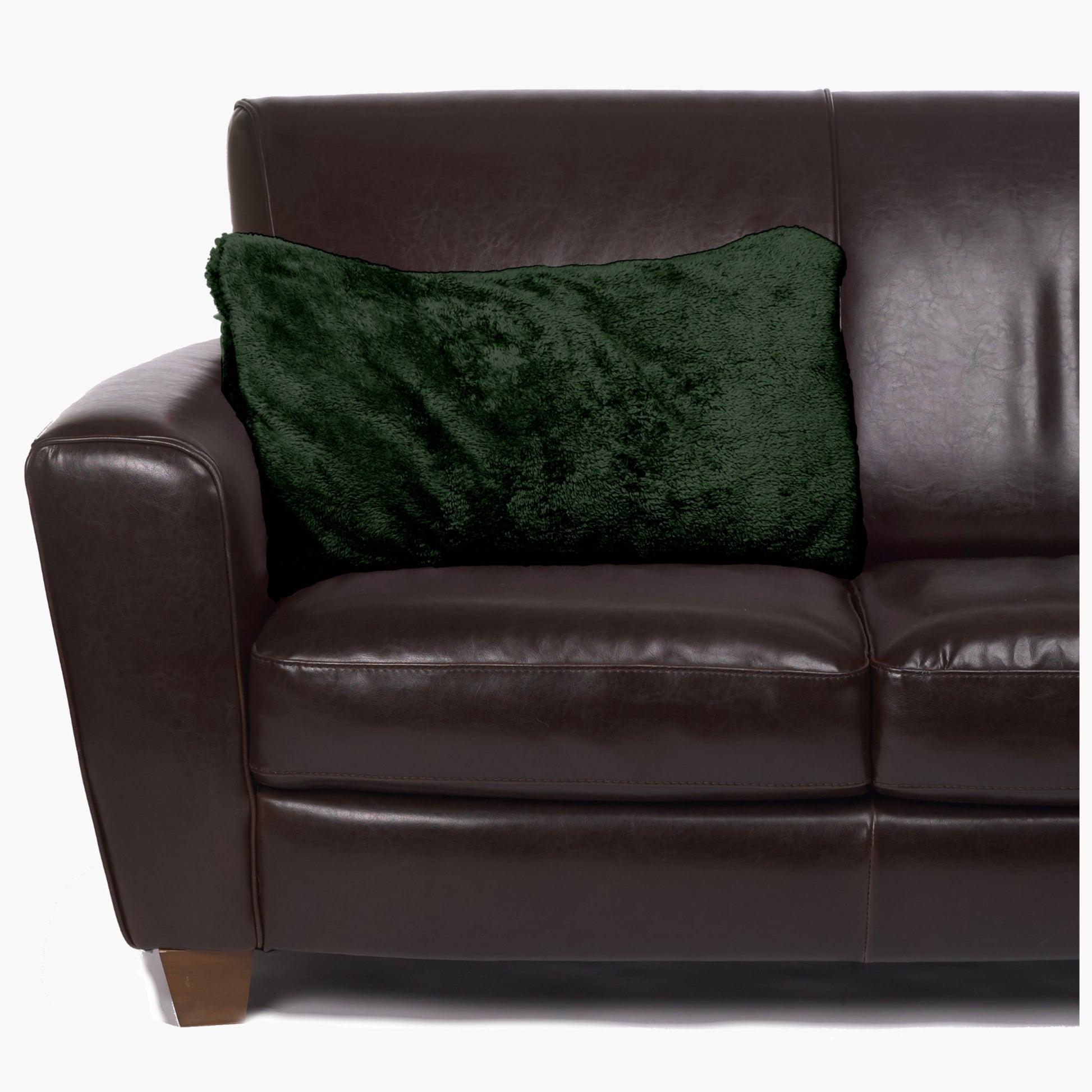 Slanket - The Original Blanket with Sleeves folds into a couch cushion which is laying on a couch