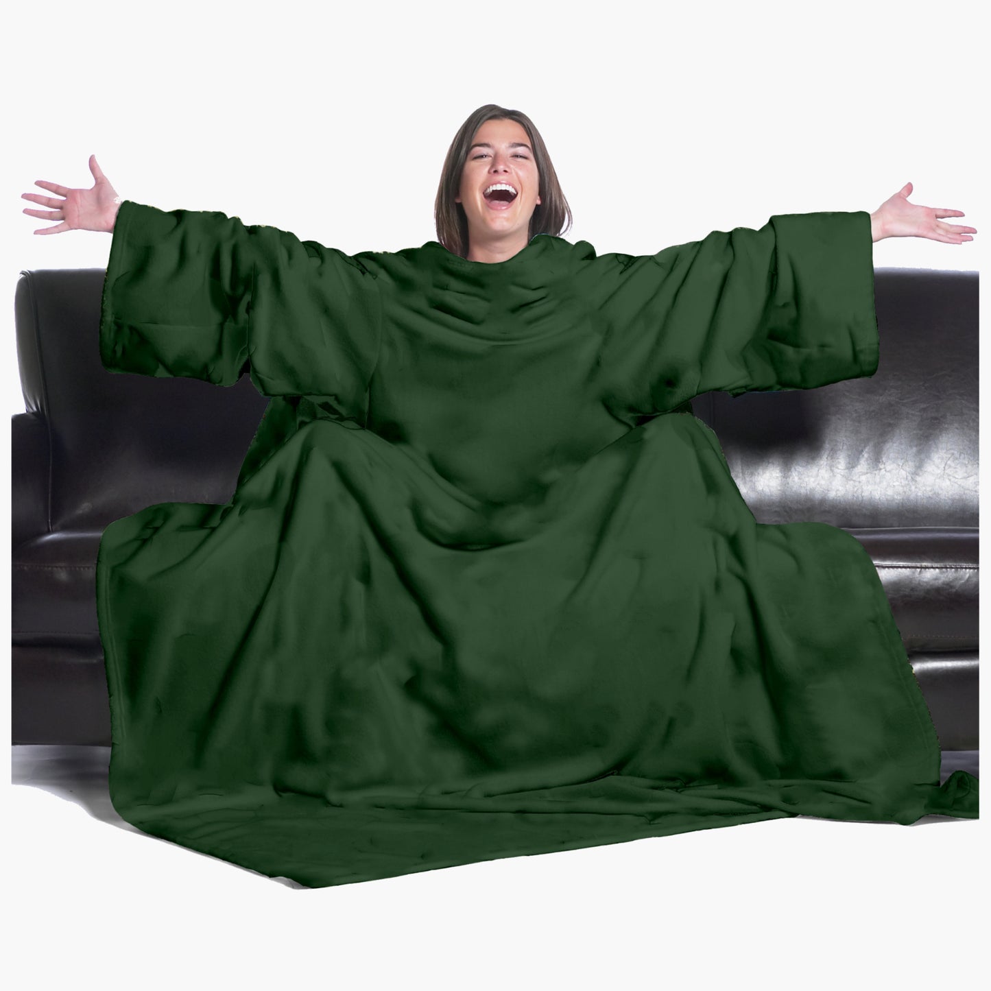The Ultimate Slanket - The Original Blanket with Sleeves. Women using it on a couch with arms spread out with big smile 
