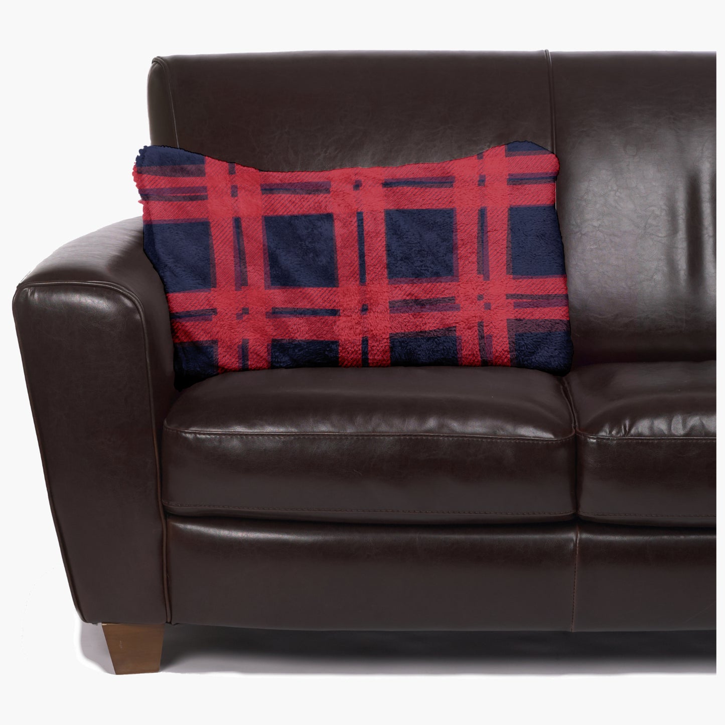 Slanket - The Original Blanket with Sleeves folds into a couch cushion which is laying on a couch