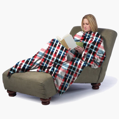 The Ultimate Slanket - The Original Blanket with Sleeves. Women using it while sitting in chaise lounge reading a book and drinking tea