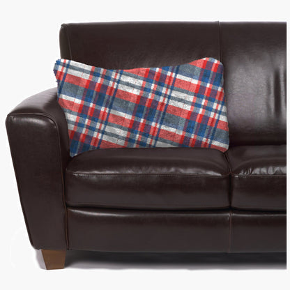 Slanket - The Original Blanket with Sleeves folds into a couch cushion which is laying on a couch