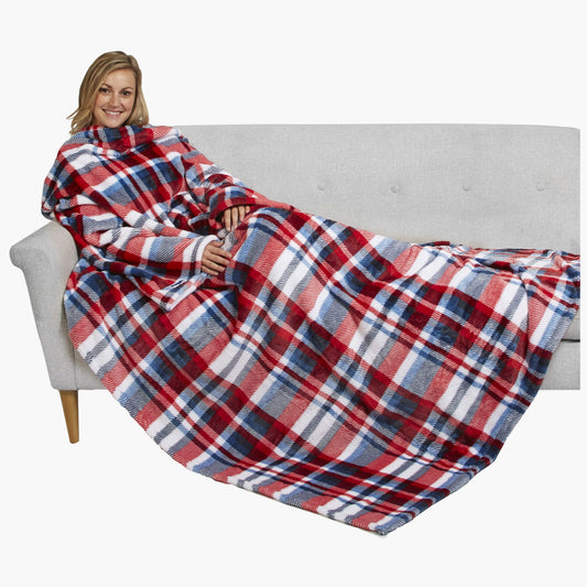 The Ultimate Slanket - The Original Blanket with Sleeves. Women using it on a couch.